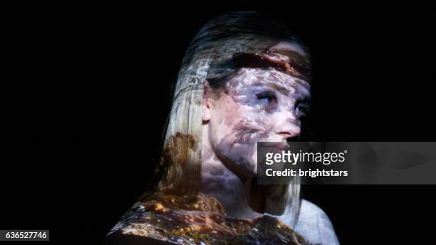 sea waves on a woman's face - double exposure portrait stock pictures, royalty-free photos & images
