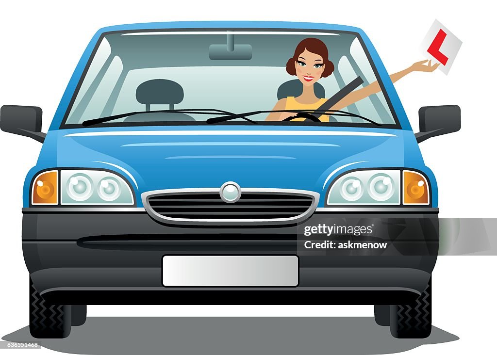 Young woman driver in a car