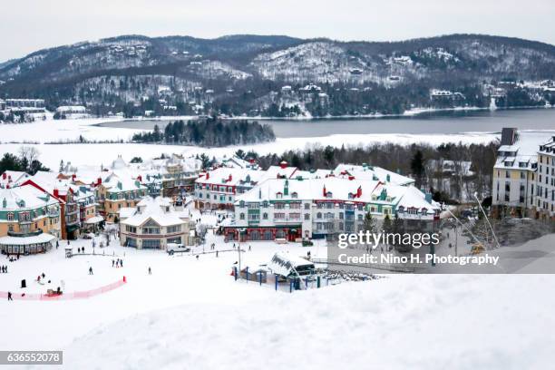 mont-tremblant ski village in winter - winter quebec stock pictures, royalty-free photos & images