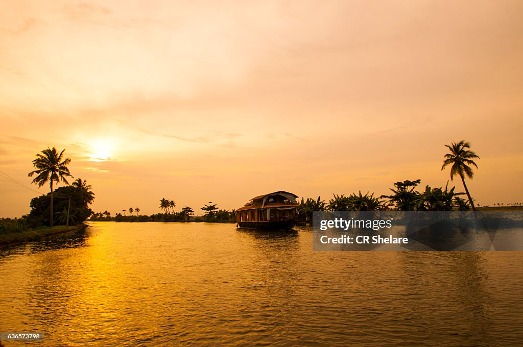 Kerala backwaters tourism travel in canoe boat. Kerala, India
