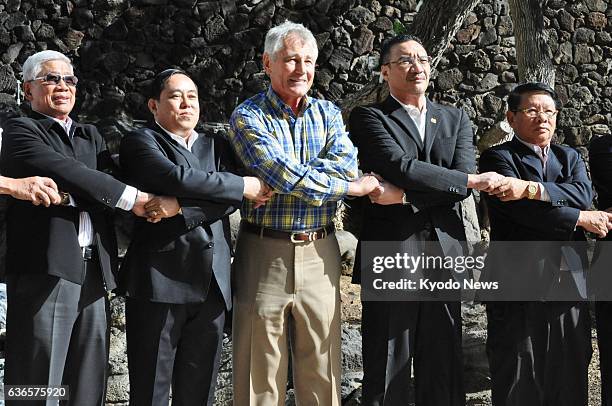 United States - U.S. Defense Secretary Chuck Hagel poses with his ASEAN counterparts as they gather for a meeting in Honolulu, Hawaii, on April 3,...