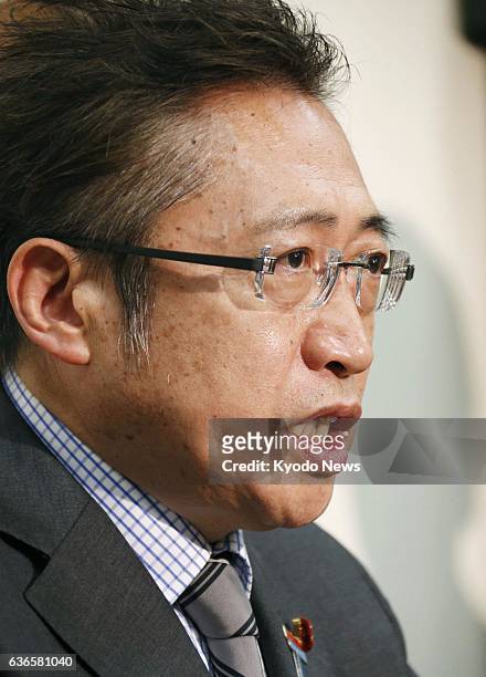 Japan - Your Party leader Yoshimi Watanabe holds a press conference at the Diet building in Tokyo on April 7 to announce he will quit as head of the...