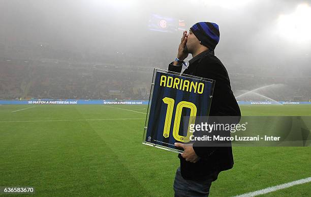 Adriano Leite Ribeiro receives a celebratory shirt before the Serie A match between FC Internazionale and SS Lazio at Stadio Giuseppe Meazza on...
