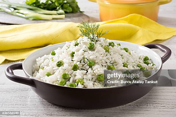 rice with green peas - pilau rice stock pictures, royalty-free photos & images