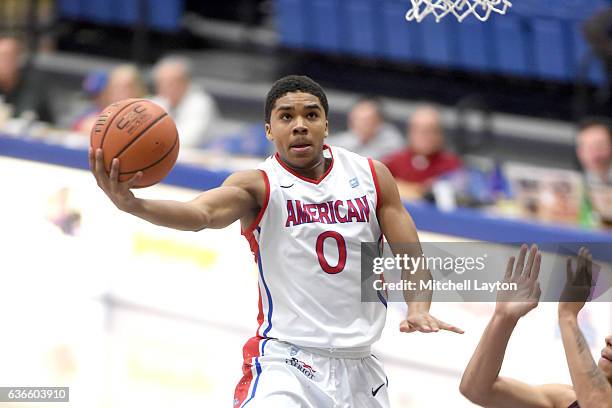 Sa'eed Nelson of the American University Eagles drives to the basket during a college basketball game against the Maryland-Eastern Shore Hawks at...