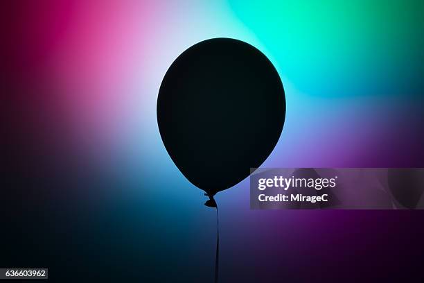 futuristic black balloon - black balloons stock pictures, royalty-free photos & images