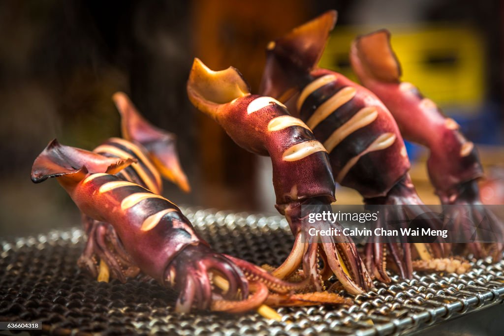 Japanese Barbecue Squid On Stick High-Res Stock Photo - Getty Images