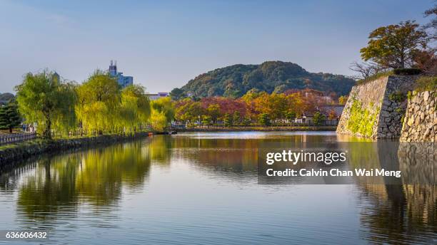 moat of himeji castle - himeji central park stock pictures, royalty-free photos & images