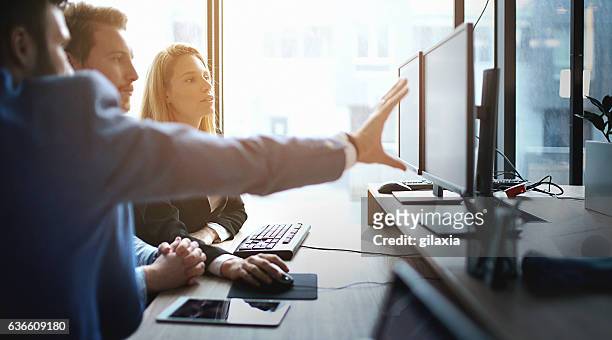 developers at work. - computer stock pictures, royalty-free photos & images