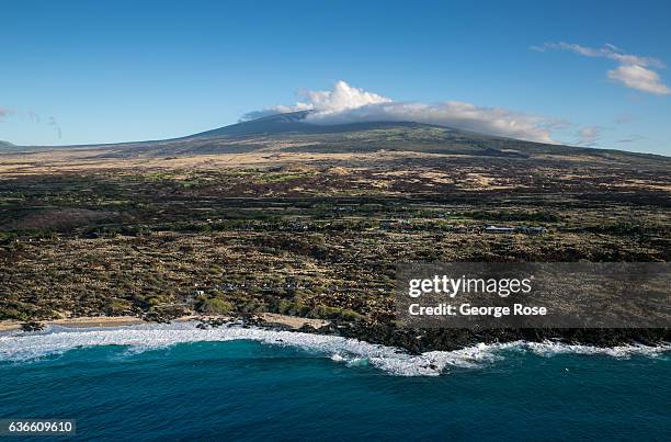Nearly deserted beach at the edge on an old Mauna Loa lava flow is viewed on December 16 in this aerial photo taken along the Kona Kohala Coast,...