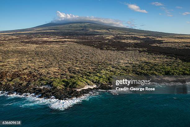 Deserted beach at the edge on an old Mauna Loa lava flow is viewed on December 16 in this aerial photo taken along the Kona Kohala Coast, Hawaii....