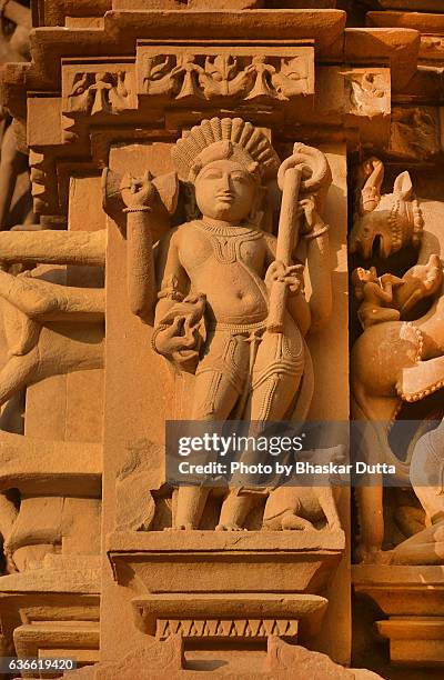 a scuplture from khajuraho temple - khajuraho statues stock pictures, royalty-free photos & images