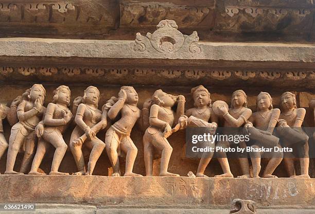 sculptures of musicians at khajuraho temple - khajuraho statues stock pictures, royalty-free photos & images