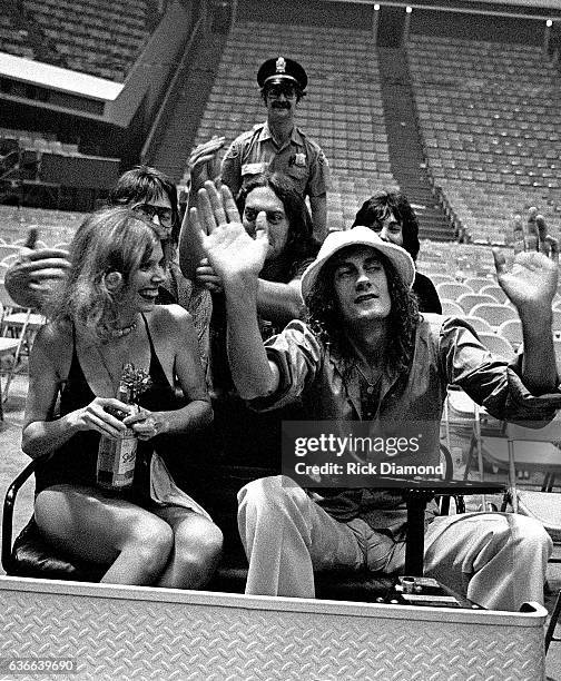 Fleetwood Mac, Rock and Roll Hall of Fame Mick Fleetwood carts with friends at The Omni Coliseum in Atlanta Georgia June 1, 1977