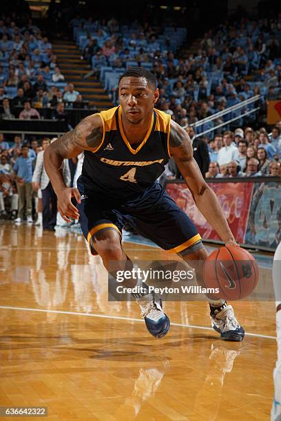 Johnathan Burroughs-Cook of the Chattanooga Mocs dribbles the ball against the North Carolina Tar Heels on November 13, 2016 at the Dean Smith Center...