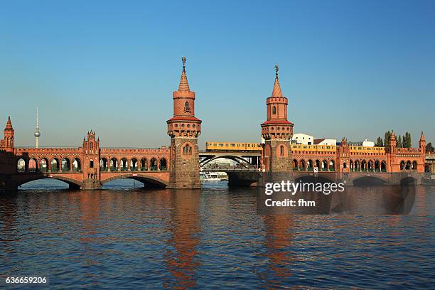 berlin skyline with oberbaumbrücke, tv-tower and subway train (kreuzberg-friedrichshain/ berlin/ germany - oberbaumbruecke stock pictures, royalty-free photos & images