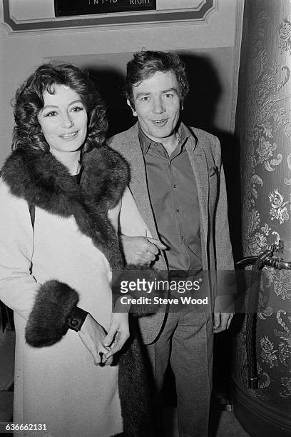English actor Albert Finney and his wife, French actress Anouk Aimée at the Apollo Theatre in London, 24th April 1971.