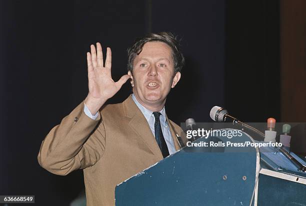 American writer and founding member of the Democratic Socialists of America, Michael Harrington speaks from the platform at the Congress of the...