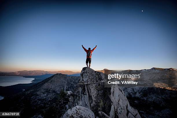 success and victory in the mountains - façanha imagens e fotografias de stock