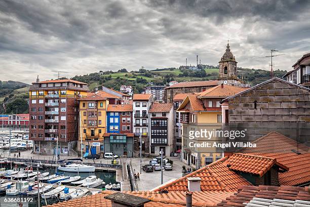 sea facade in the port of bermeo. storm clouds - vizcaya province stock pictures, royalty-free photos & images