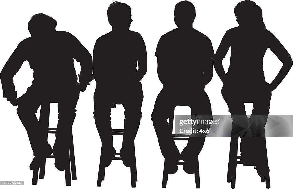 People sitting on stool