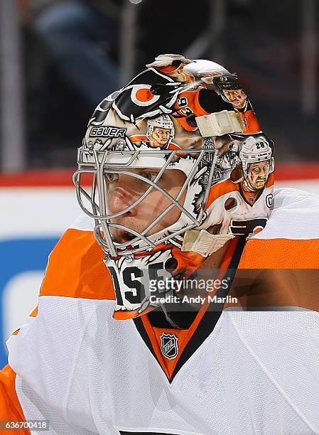 Steve Mason of the Philadelphia Flyers looks on during the game against the New Jersey Devils at Prudential Center on December 22, 2016 in Newark,...