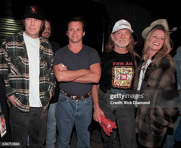 Columbia Co - Founders Neil Young, John Mellencamp and Willie Nelson with Singer/Songwriter Deana Carter backstage during Farm Aid 1996 hosted by...