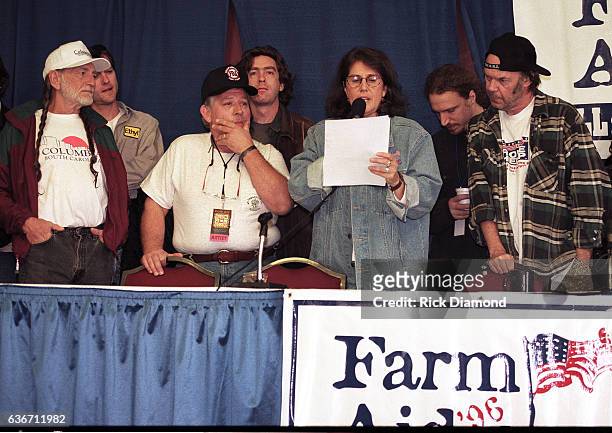 Columbia Farm Aid founder Willer Nelson, Singer/Songwriter John Conlee, Farm Aid Executive Director Carolyn Mugar and Neil Young attend press...