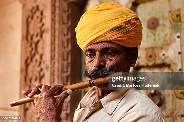 indian musician playing flute, jodhpur, rajasthan - flautist stock pictures, royalty-free photos & images
