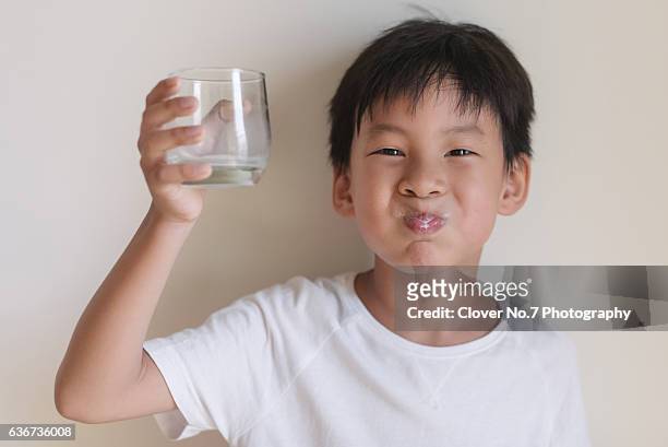 energetic day - asia child glasses stock-fotos und bilder