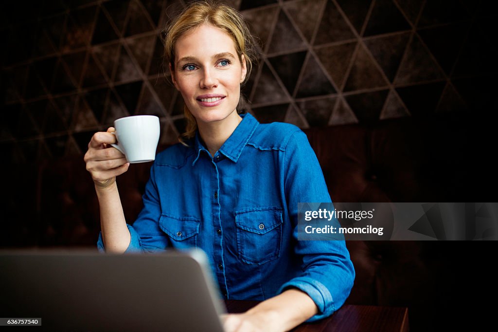 Beautiful female working on a laptop
