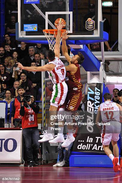 Stefano Tonut of Umana competes with Mantas Kalnietis and Zoran Dragic of Armani during the Legabasket of Serie A1 match between Reyer Umana Venezia...