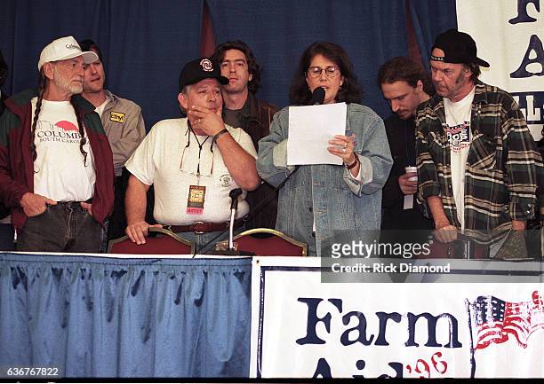 Columbia Farm Aid founder Willie Nelson Singer/Songwriter John Conlee, Farm Aid Executive Director Carolyn Mugar and Singer/Songwriter Neil Young...