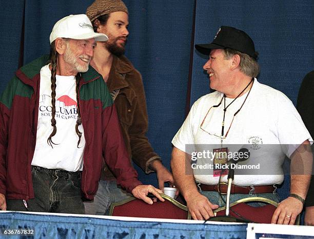 Columbia Farm Aid founder Willie Nelson and Singer/Songwriter John Conlee attend press conference during Farm Aid 1996 hosted by Hootie & the...