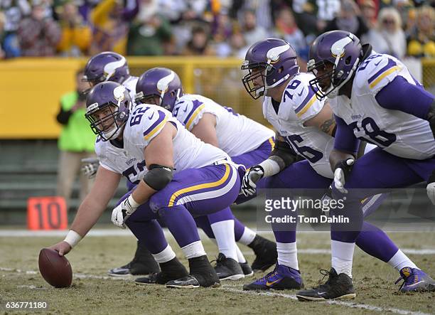 Nick Easton of the Minnesota Vikings centers the ball during a game against the Green Bay Packers at Lambeau Field on December 24, 2016 in Green Bay,...