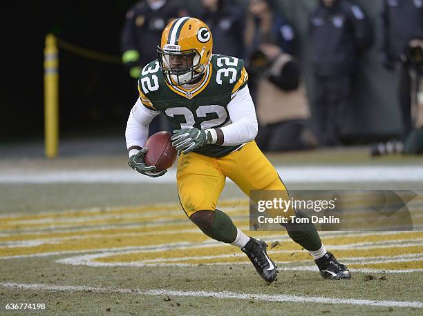 Christine Michael of the Green Bay Packers returns a kickoff during a game against the Minnesota Vikings at Lambeau Field on December 24, 2016 in...