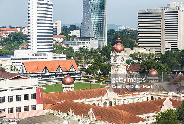 sultan abdul samad building by merdeka square in the heart of kuala lumpur, - dataran merdeka stockfoto's en -beelden