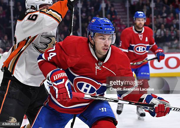 Alexei Emelin of the Montreal Canadiens skates against Simon Despres of the Anaheim Ducks in the NHL game at the Bell Centre on December 20, 2016 in...