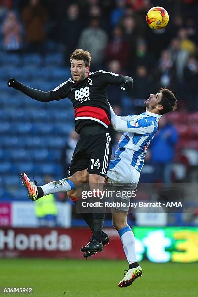 Nicklas Bendtner of Nottingham Forest and Christopher Schindler of Huddersfield Town during the Sky Bet Championship match between Huddersfield Town...