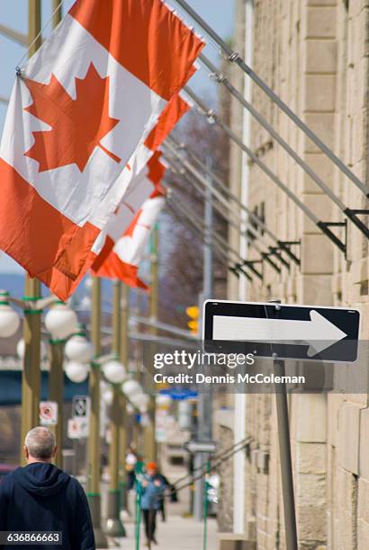 canadian flags - dennis day stock pictures, royalty-free photos & images