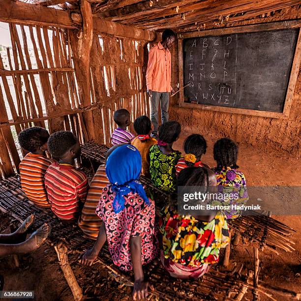 african children during english class, southern ethiopia, east africa - etiópia imagens e fotografias de stock