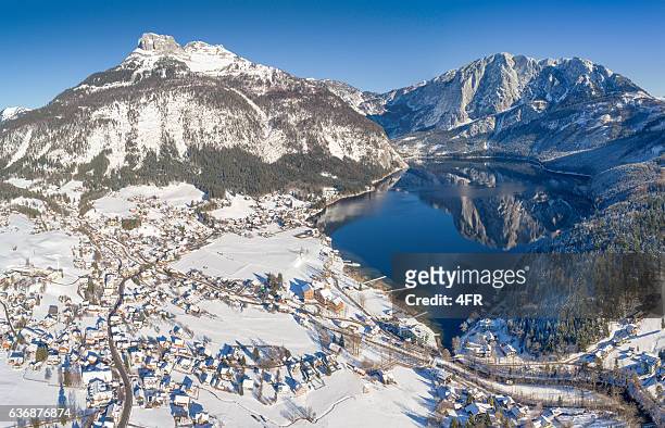lake altausee with mountains loser and trisselwand, winter panorama, austria - frozen lake stock pictures, royalty-free photos & images