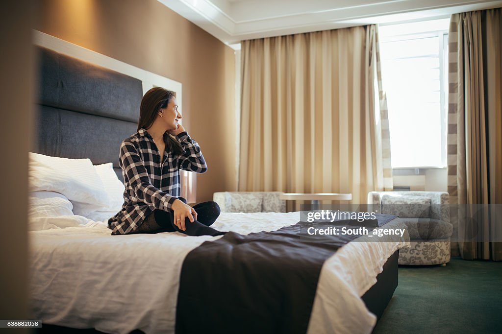 Woman in hotel suite