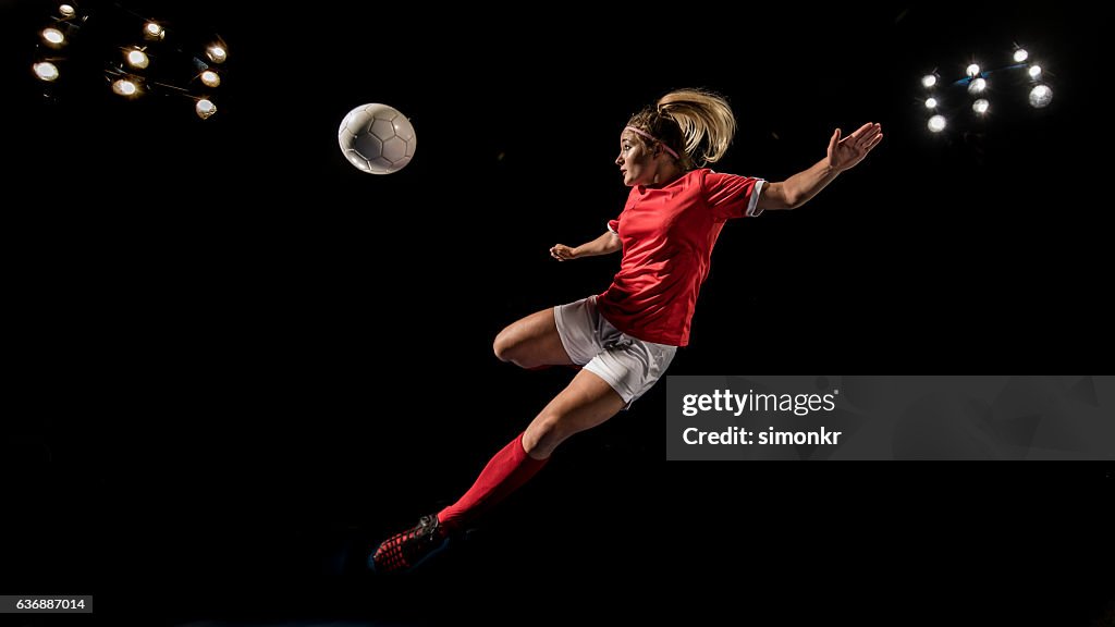 Soccer player kicking