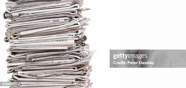 pile of newspapers on white with copy space - the media stock pictures, royalty-free photos & images