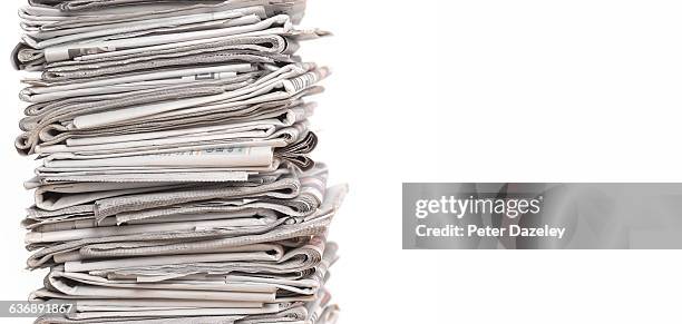 pile of newspapers on white with copy space - news stock pictures, royalty-free photos & images