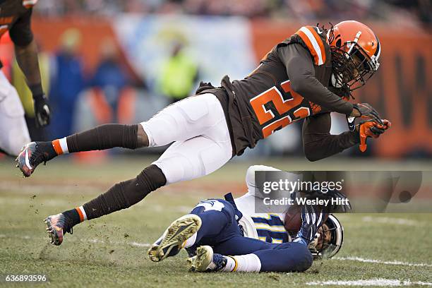 Tramon Williams Sr. #22 of the Cleveland Browns tackles Tyrell Williams of the San Diego Chargers at FirstEnergy Stadium on December 24, 2016 in...