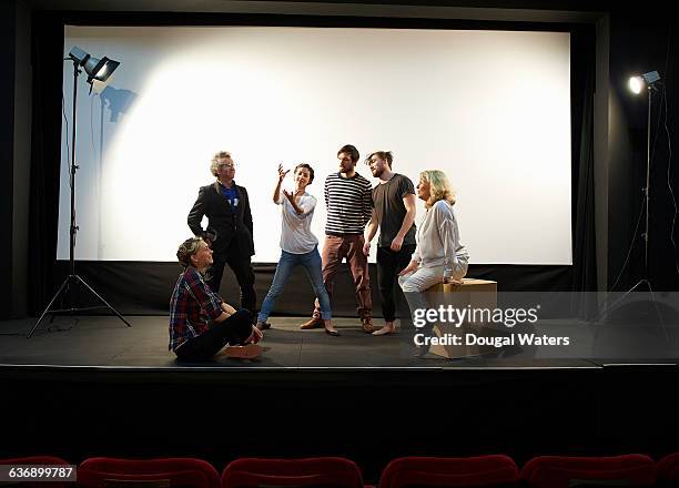 community theatre group on stage. - performance collective stockfoto's en -beelden