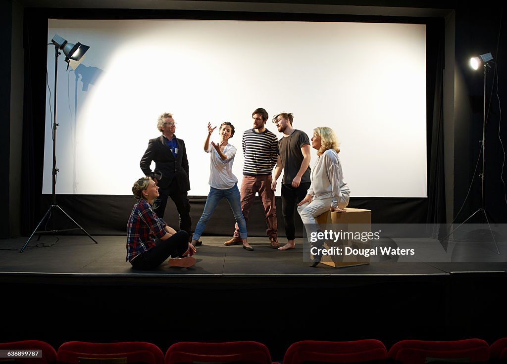Community theatre group on stage.