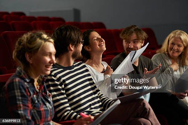 theatre group discussing script. - actress rehearsing stock pictures, royalty-free photos & images